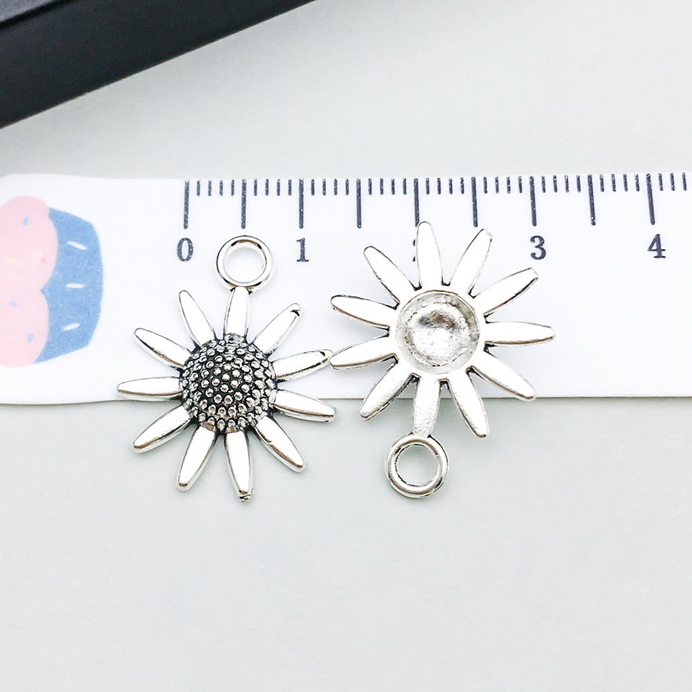 14:1 ancient silver sunflower 19*23mm-1.4g-11412