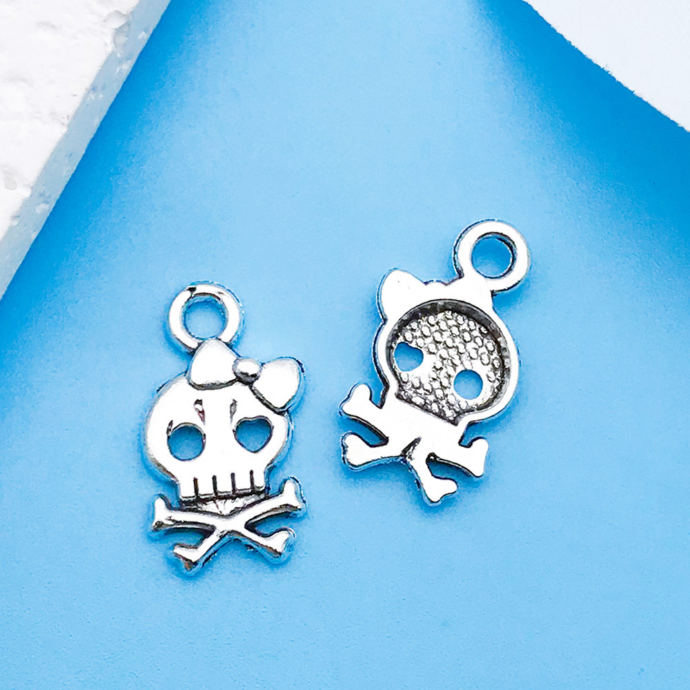 11:1 ancient silver skull 9x 15.5mm-10878-0.5g