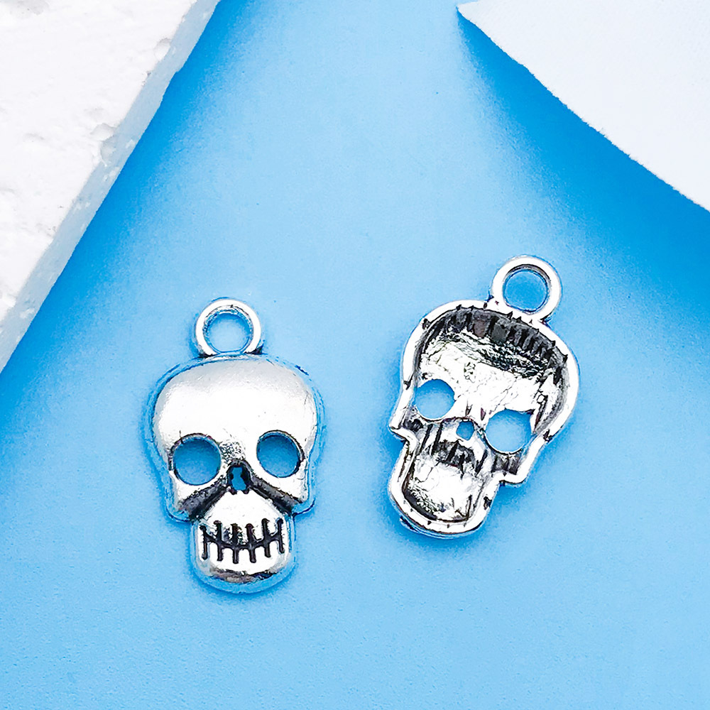 13:1 ancient silver skull 10x16mm-10882-0.4g