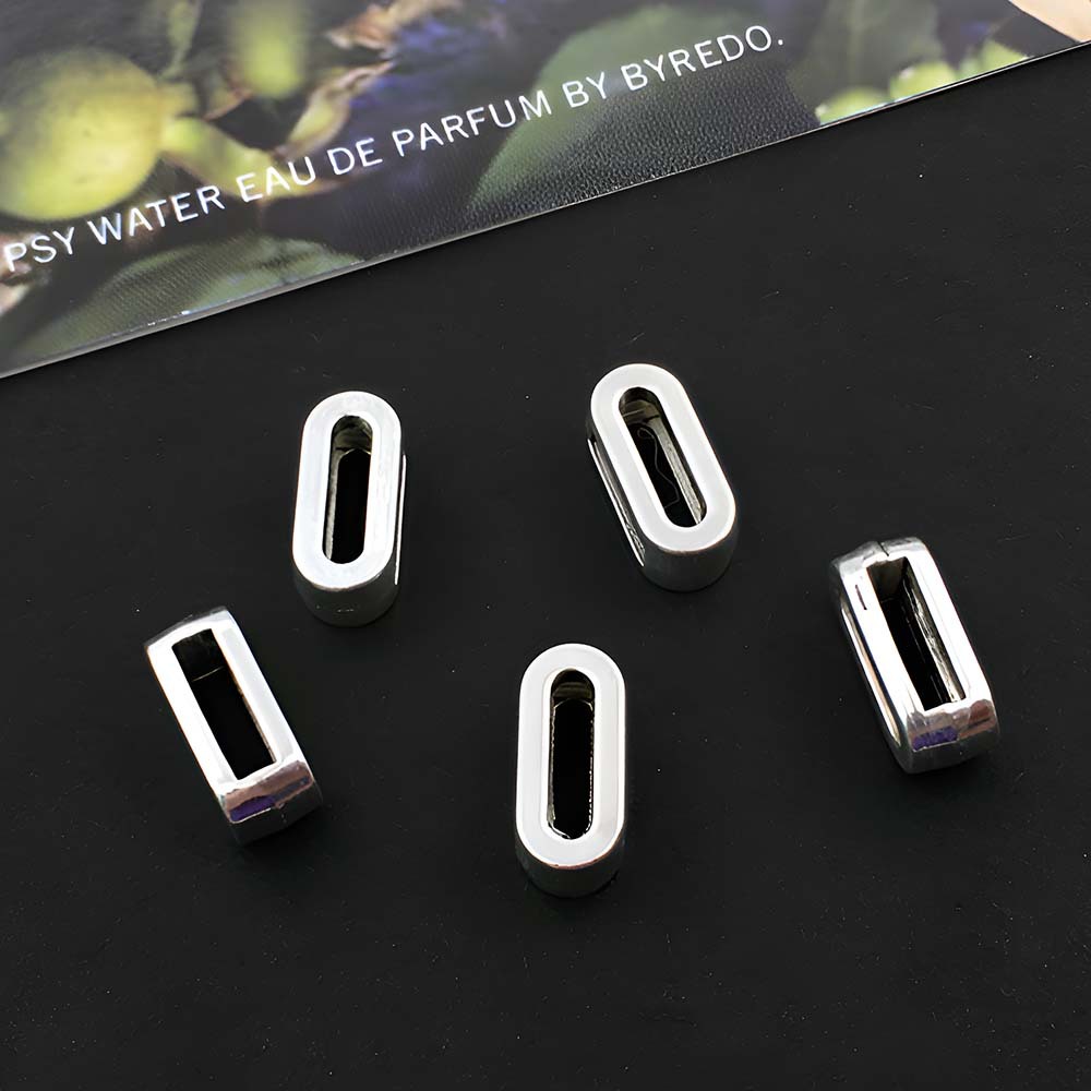 16:1 ancient silver perforated letter O-5x10mm-0.5g