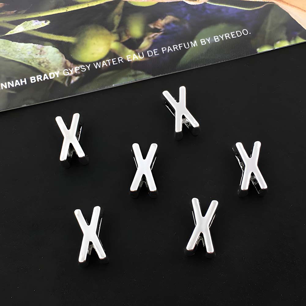 25:1 ancient silver perforated letter X-5x10mm-0.6g