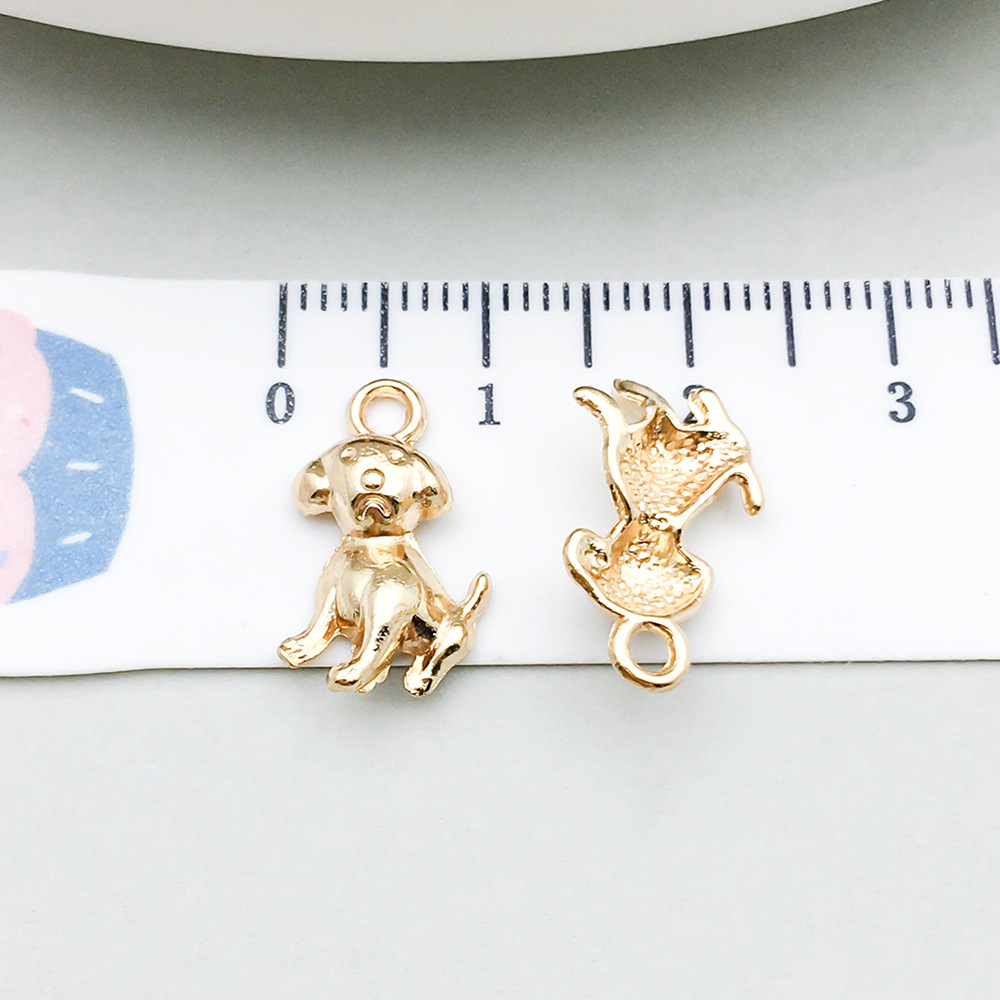 4:1 kc gold sitting dog 17*10mm-0.7g-20518