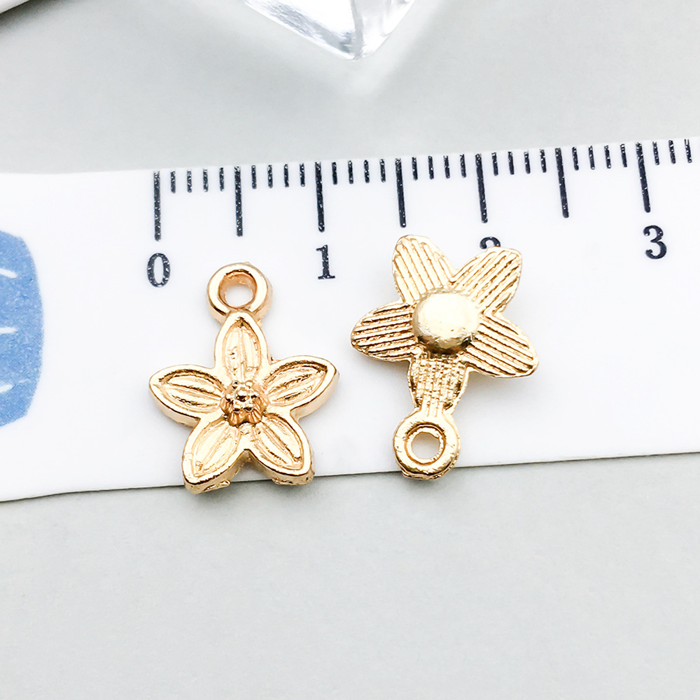 3:1 kc gold flower 11*14mm-0.7g-18326