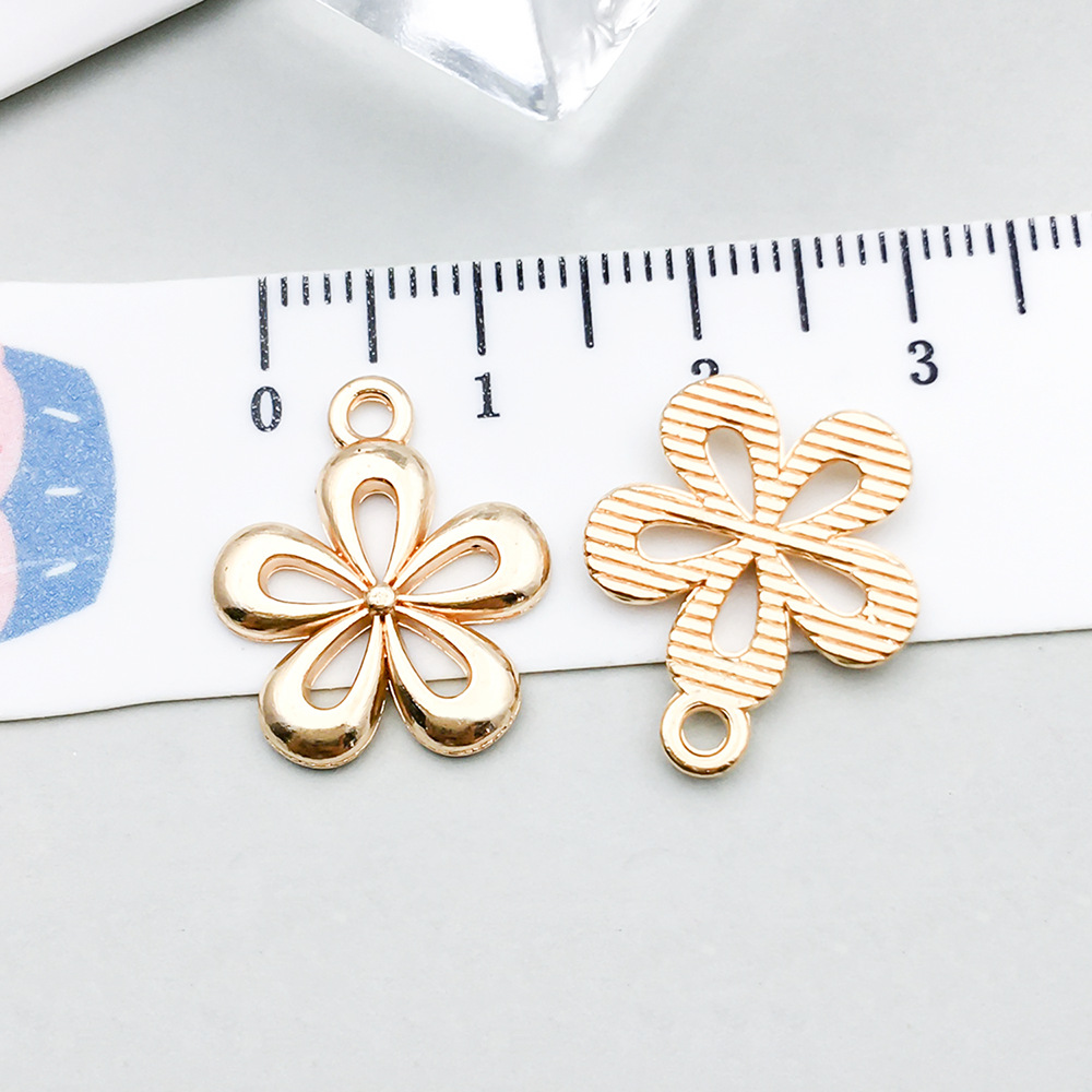 5:1 kc gold hollow flower 18*15mm-1.1g-20501