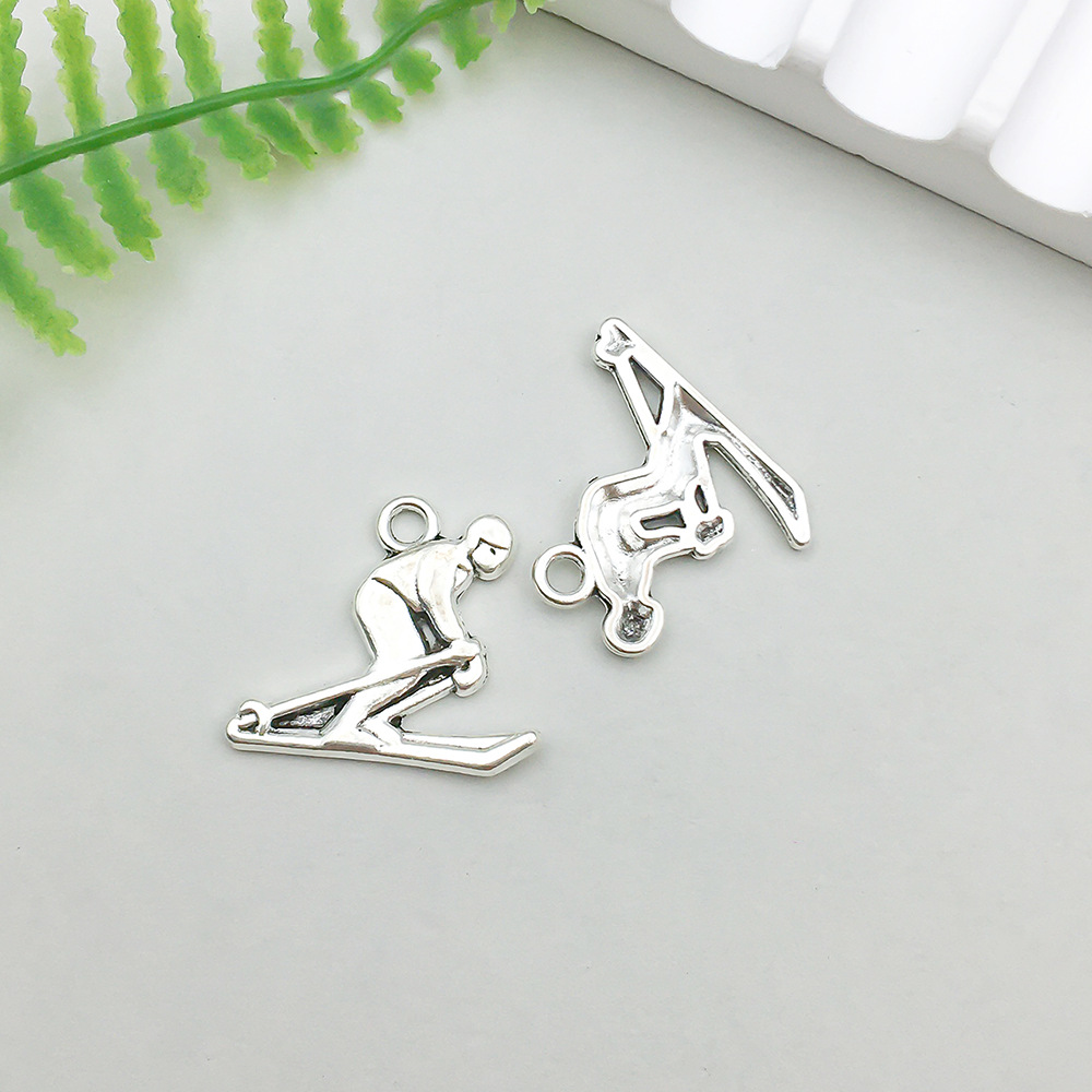 20:1 ancient silver ski player 18*16mm-1g-11320