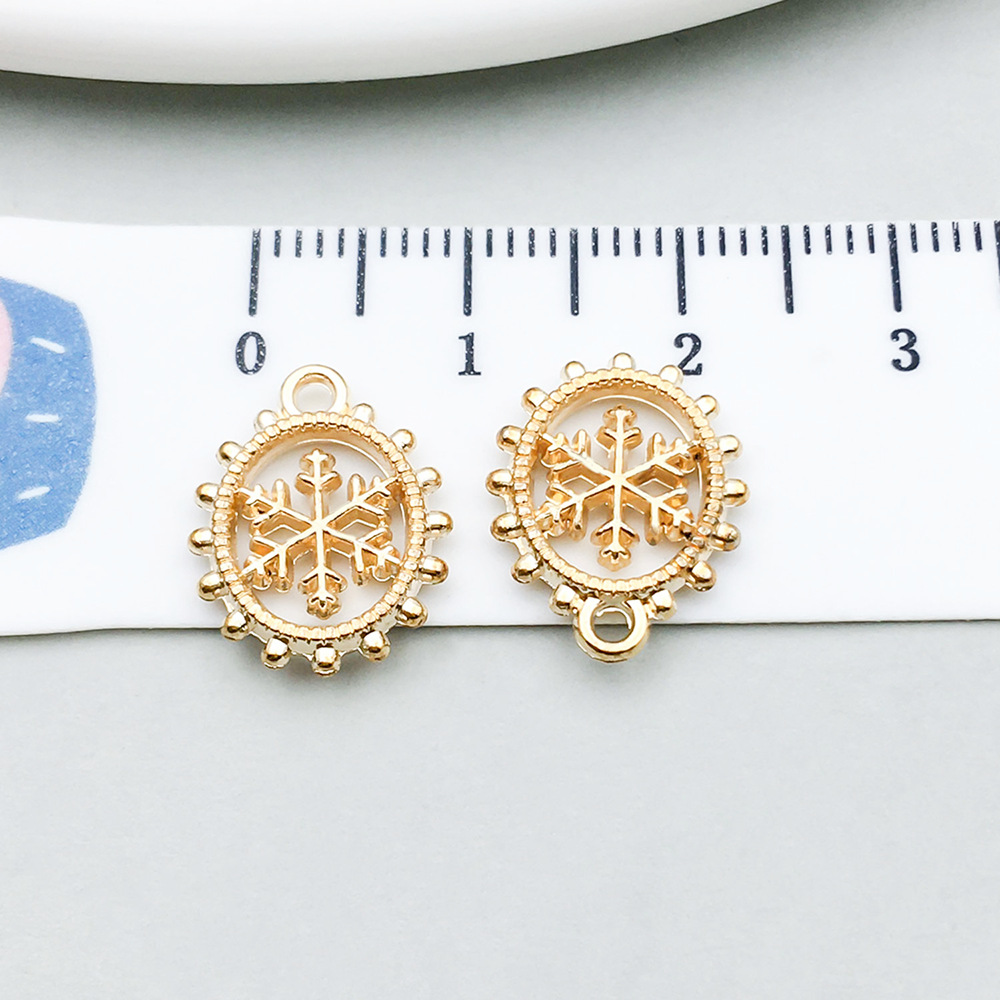 2:1 kc gold christmas snowflake 12*15mm-0.8g-11628