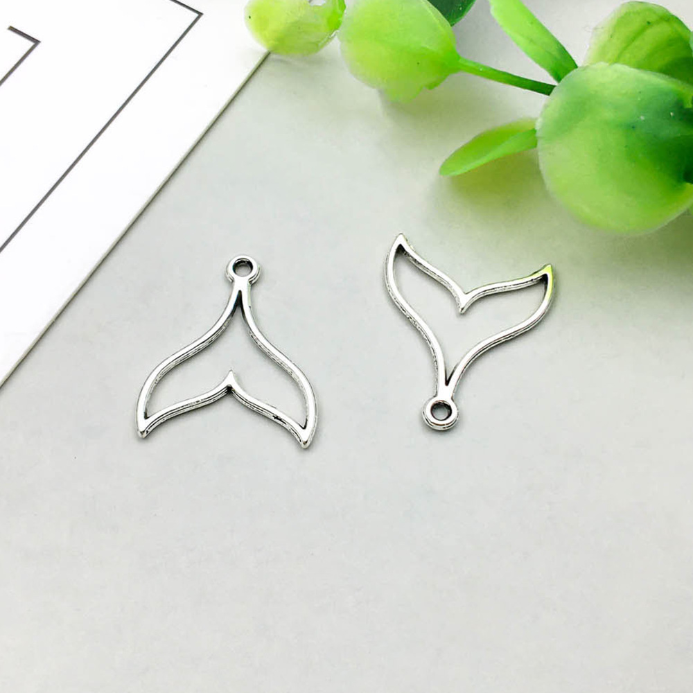 12:1 ancient silver hollow fish tail 17*20mm-0.5g-15555