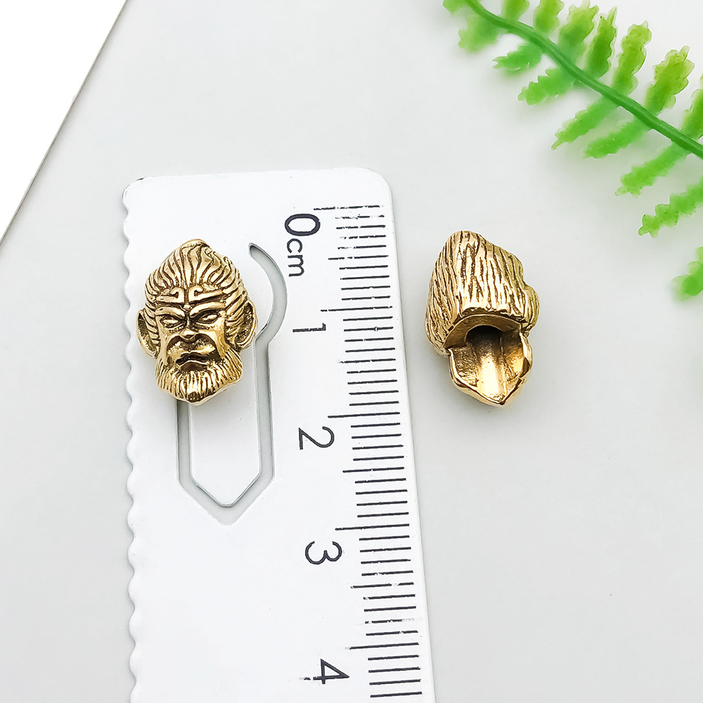 2:1 ancient gold saint buddha head of qitian 15*10mm-3.7g-21007