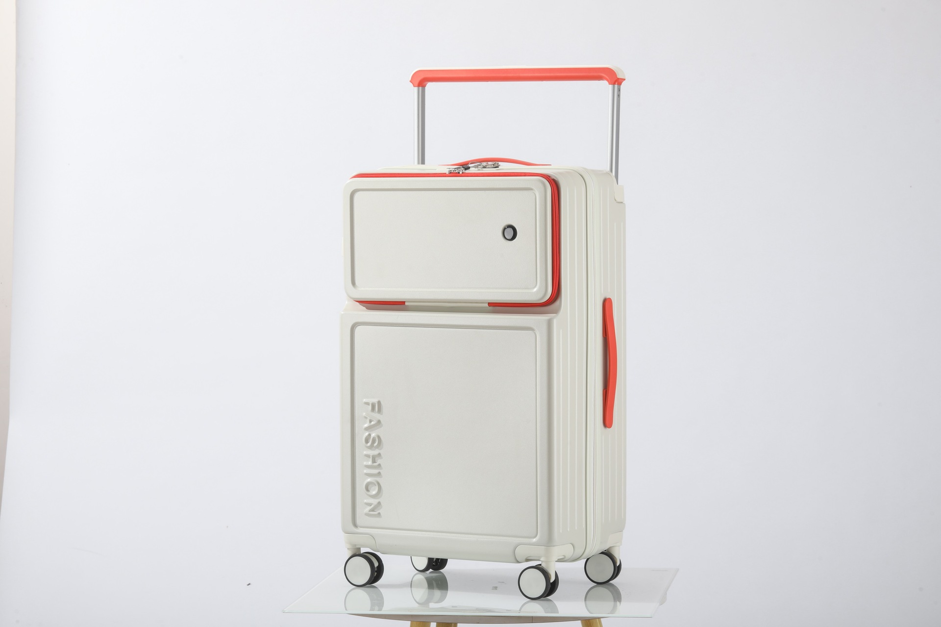White box with red handle zipper
