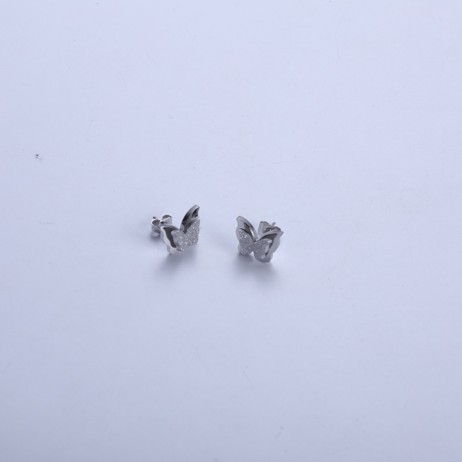 3:Steel color butterfly earrings