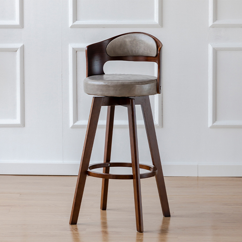 Brown wooden feet   gray leather