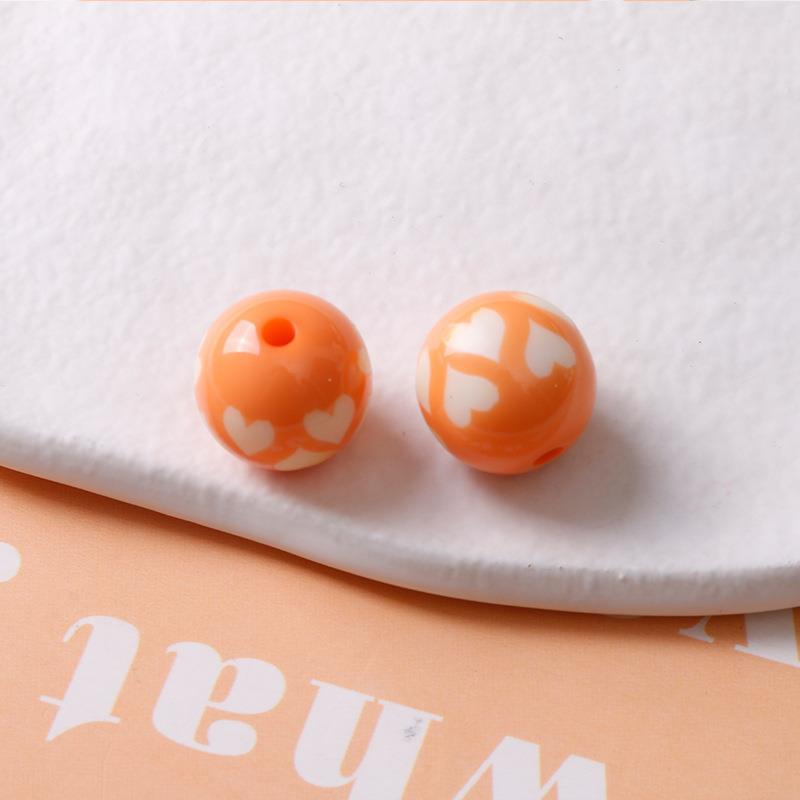 28:Orange heart beads