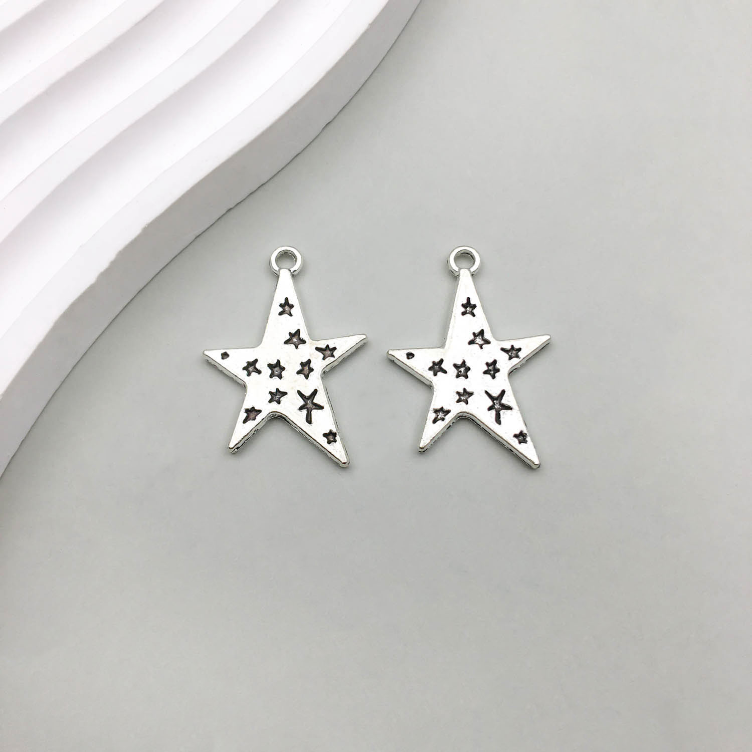 14:1 Ancient silver star 21*30mm-2.4g-10946
