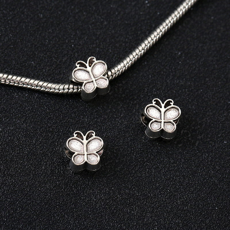 4:Butterfly (approximately length: 0.9cm width: 0.9cm aperture: 0.4cm)