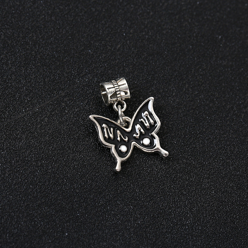 9:Large butterfly (approximately: 2cm wide: 1.7cm aperture: 0.6cm)