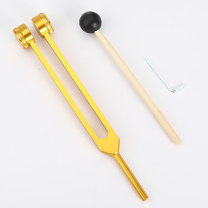Golden tuning fork gear head