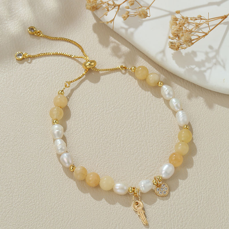 4:B4274 natural pearl love key topaz