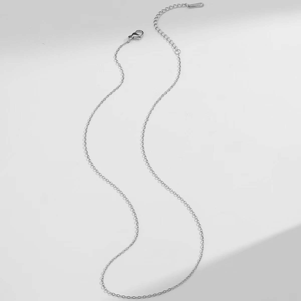 3:Steel color cross chain