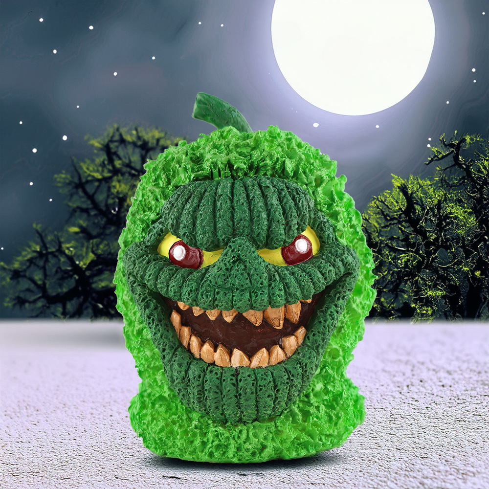 Green pumpkin monster ornament