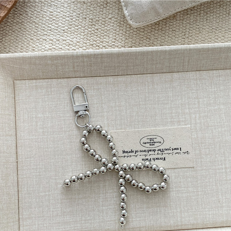 3:Silver bow pendant