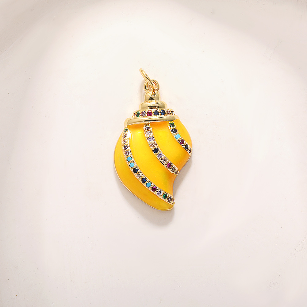 7:A609 yellow conch with colored zircons