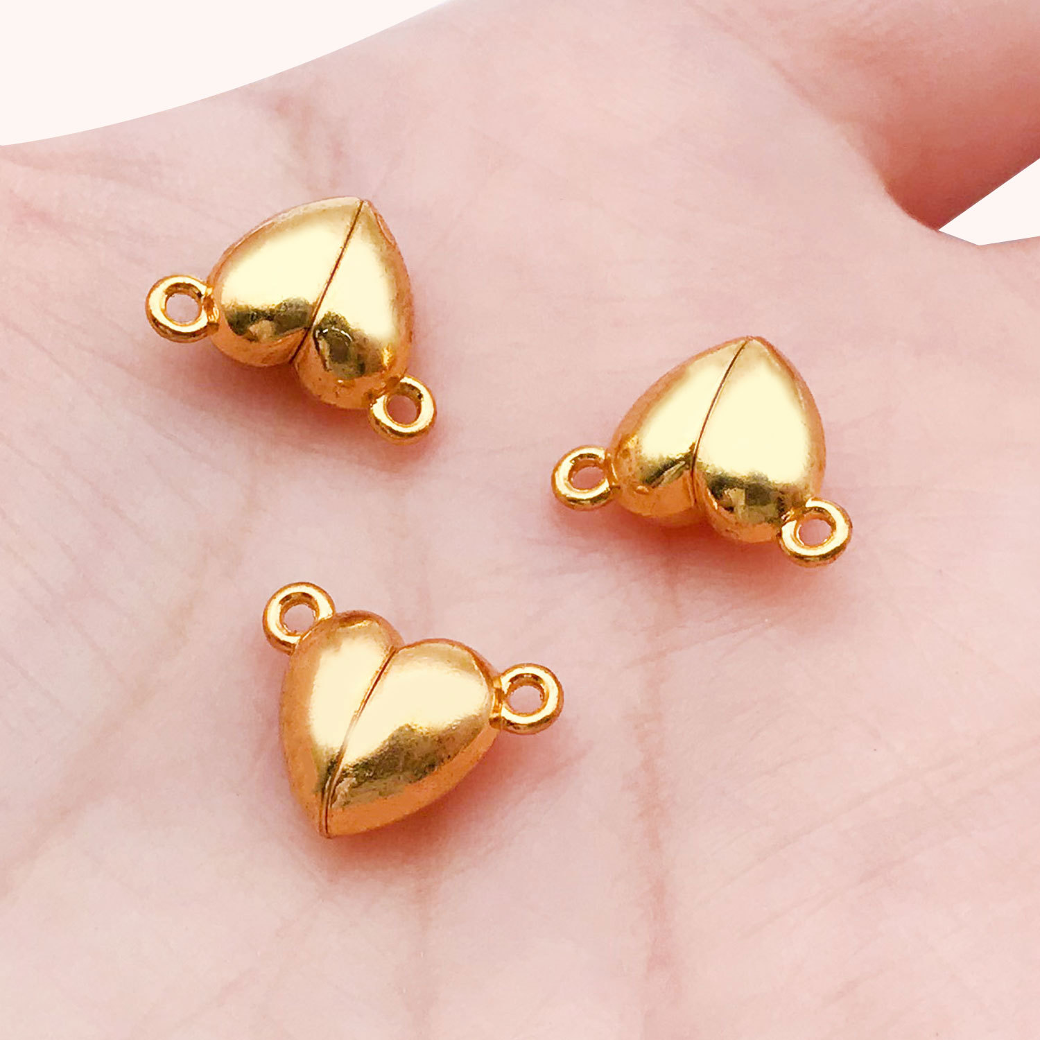13:14696-small gold zinc alloy peach heart-shaped magnet buckle 12x5-1.3g