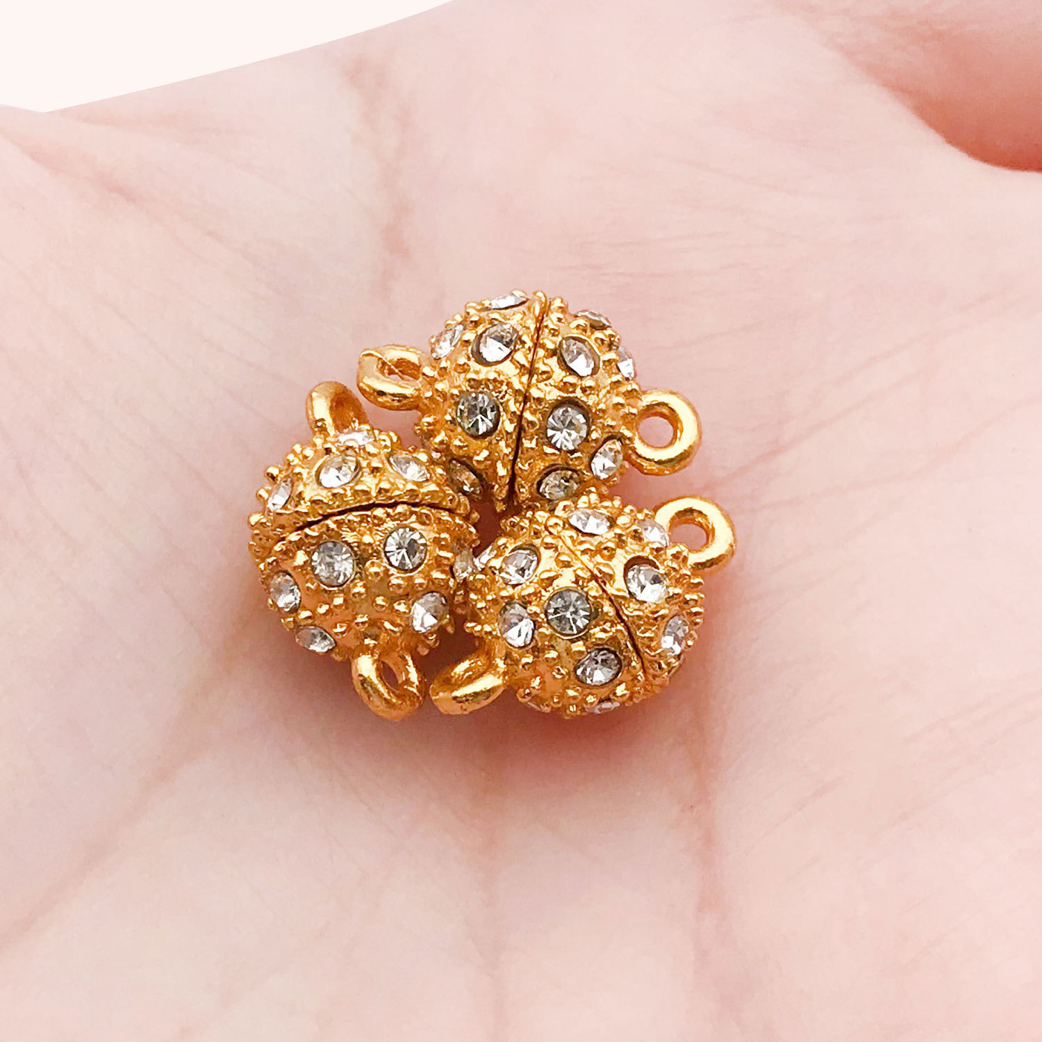 15:14698-golden zinc alloy spherical point diamond magnet buckle 13x8-2.3g