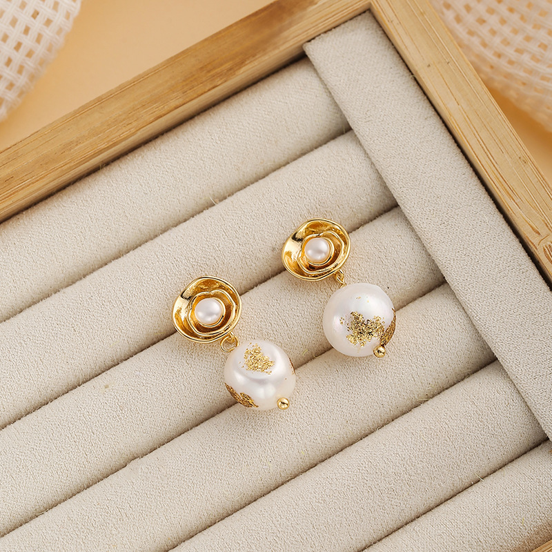 Natural pearls embellished with gold foil (baroque