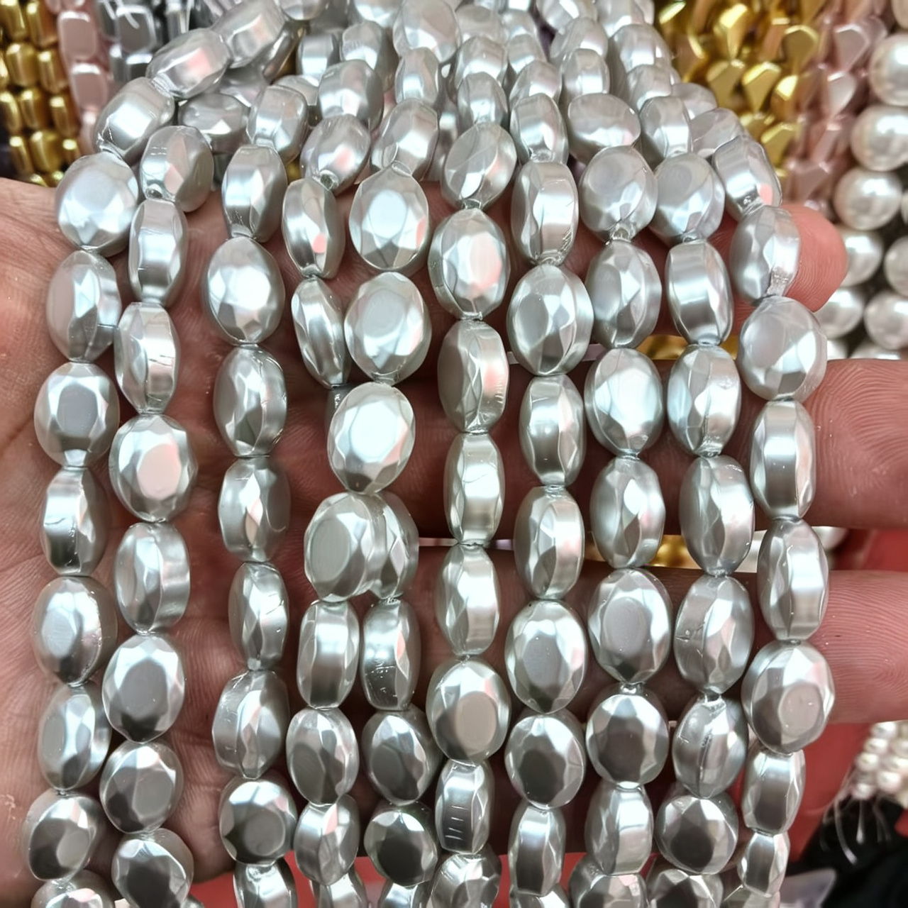 26:9x12mm egg-shaped gray