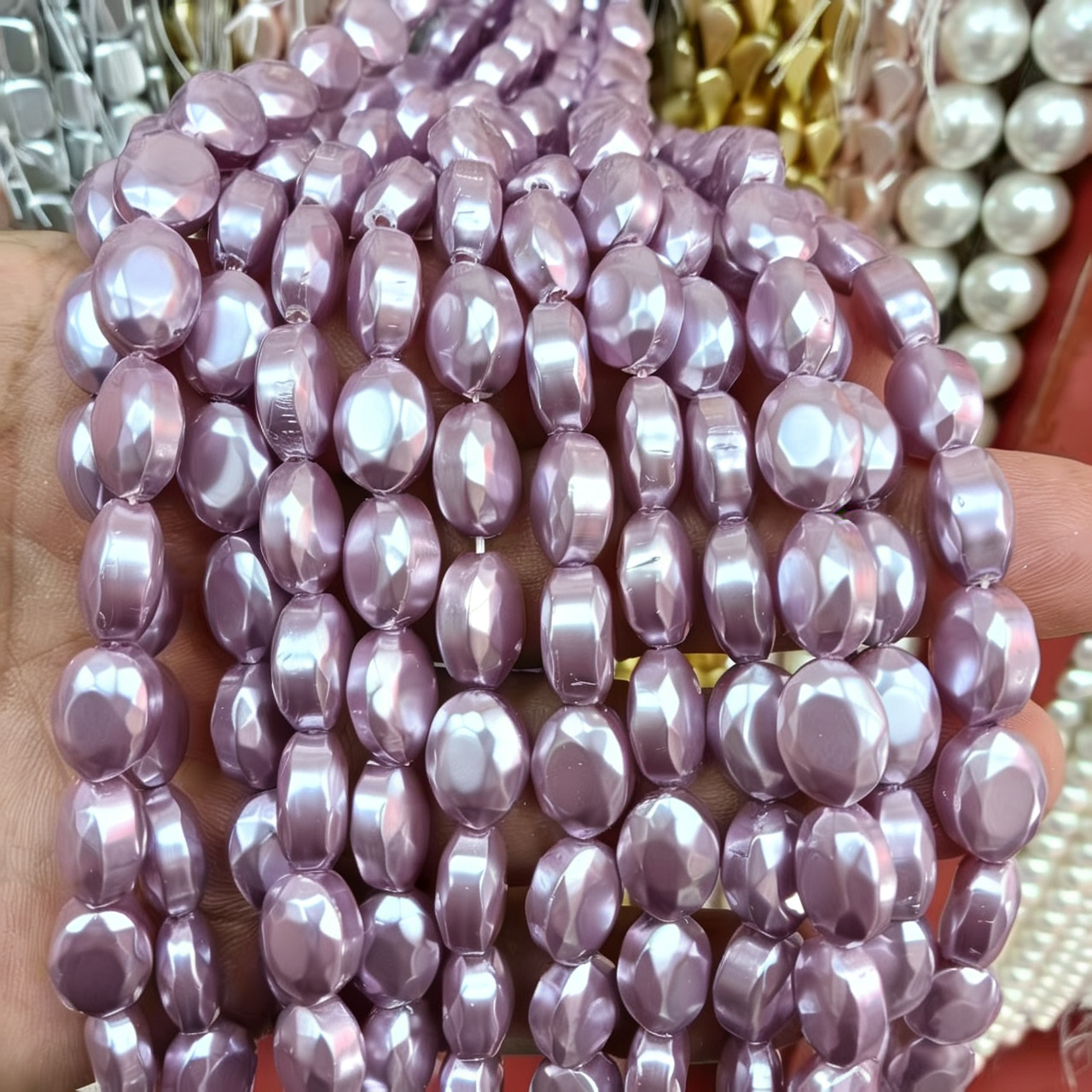 27:9x12mm egg-shaped purple