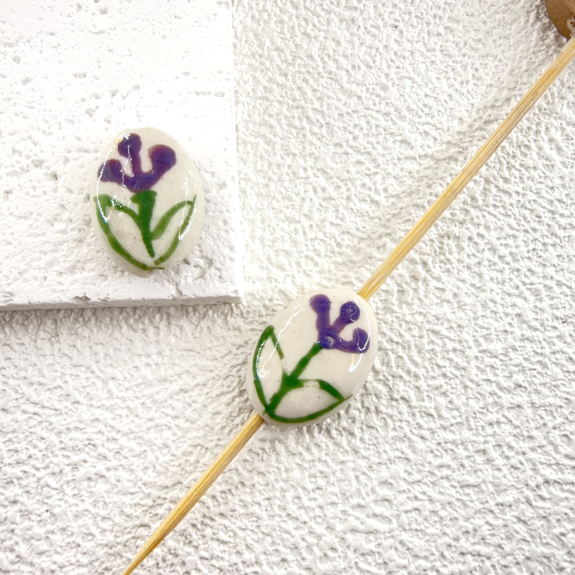 9:(olive shape) dark purple 19.5x14.5mm