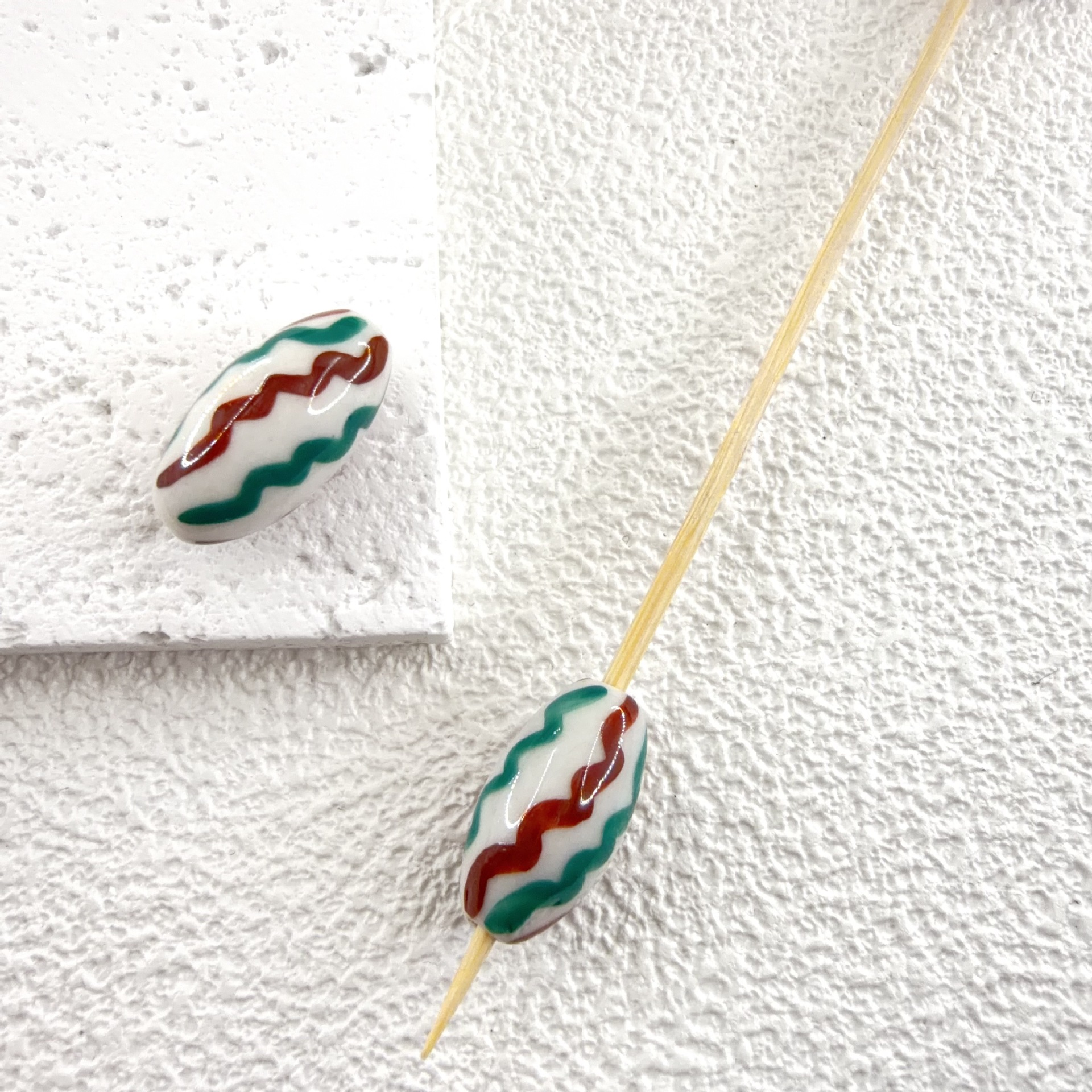 11:(olive shape) 1 long bead 8.5x10mm