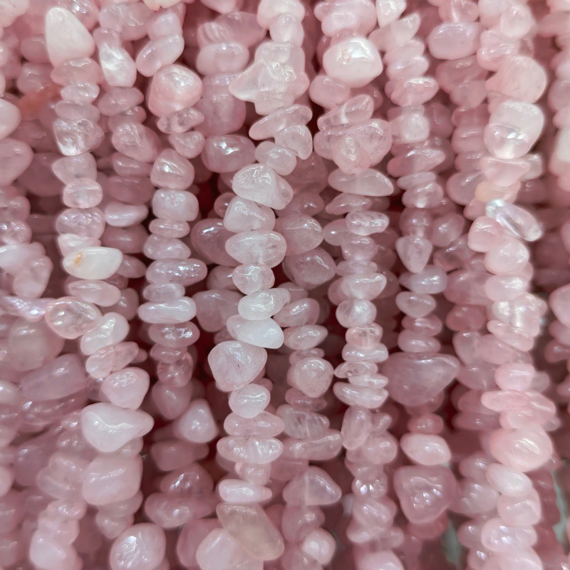 65 synthetic Fried rose quartz with added color