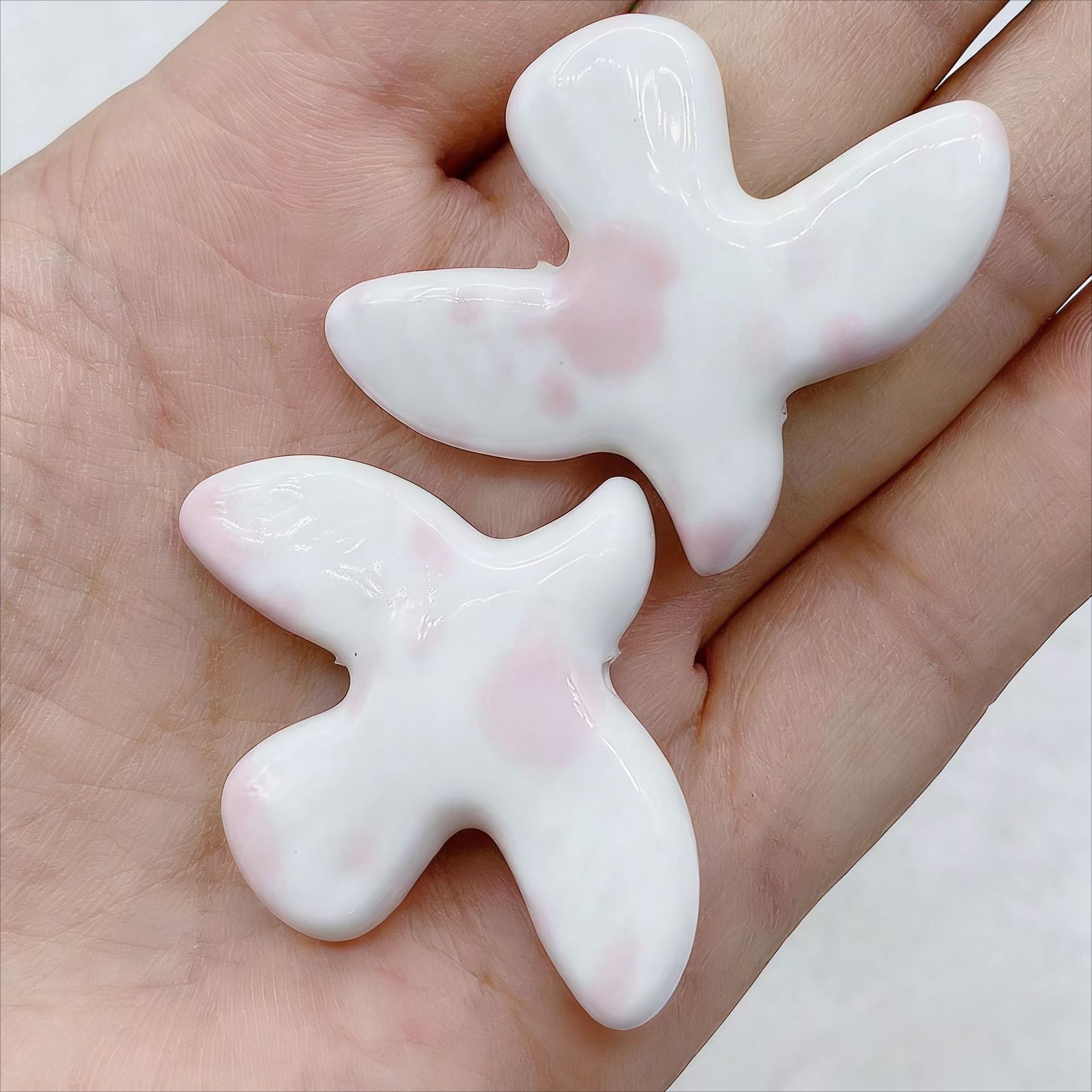 3:Pink smudge on white background