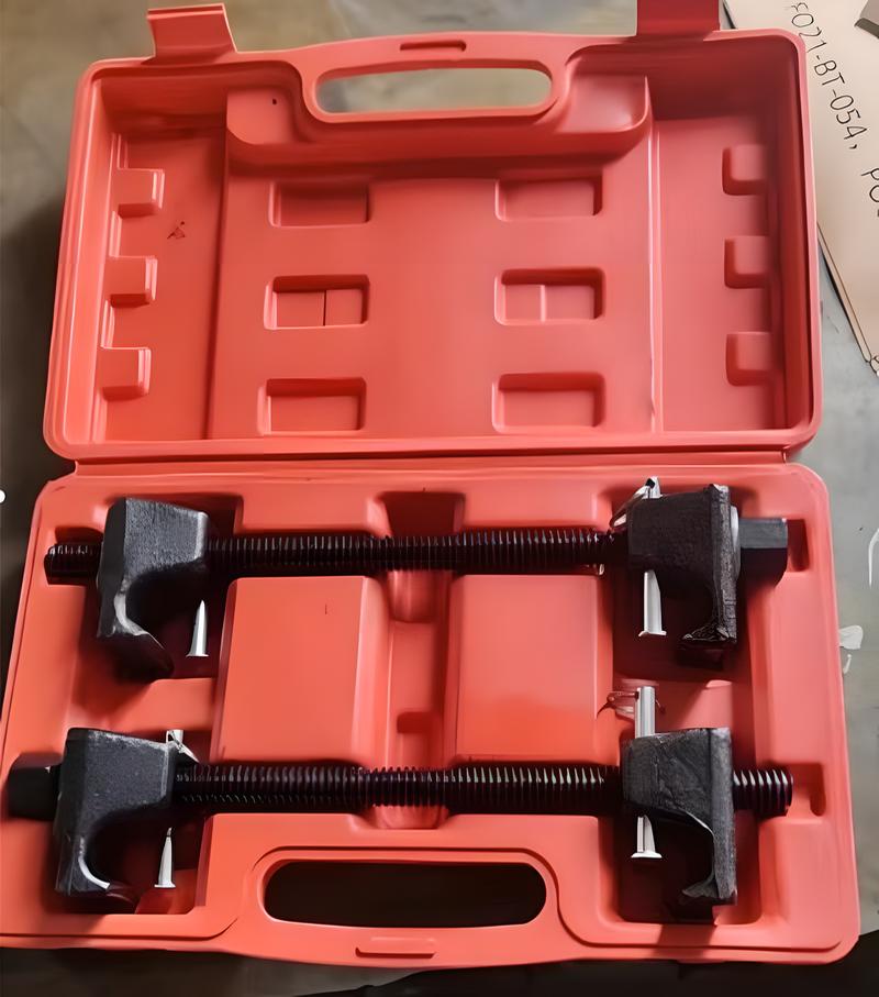 Heavy duty spring shock compressor