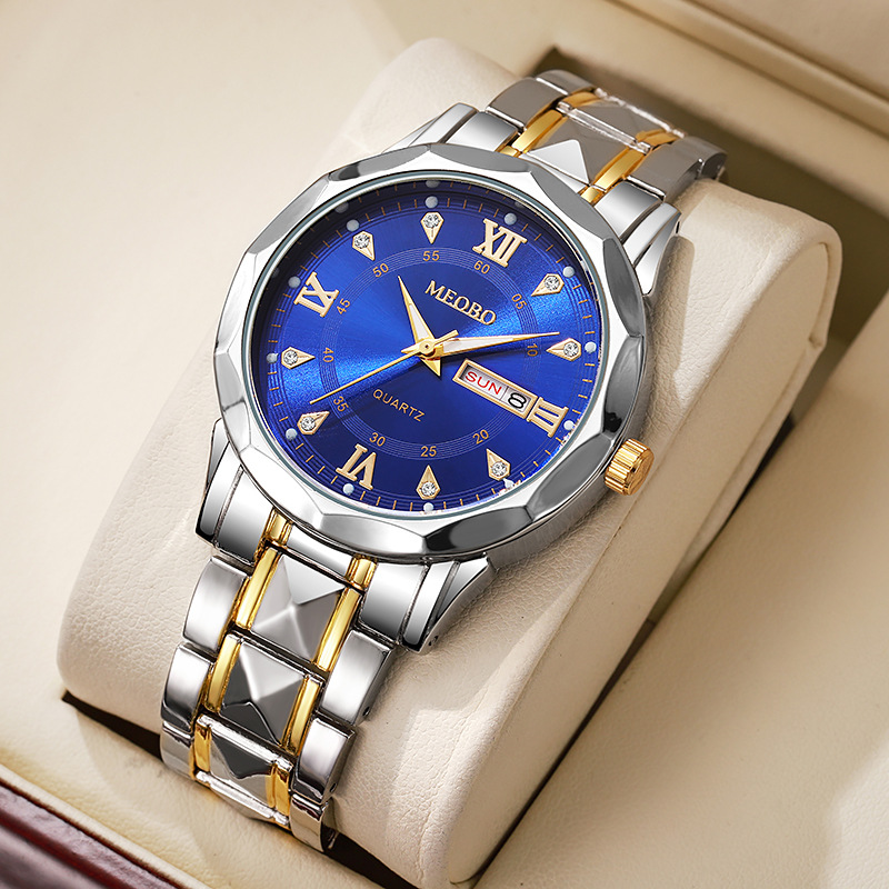 2:Two-tone gold and blue dial with roman numerals