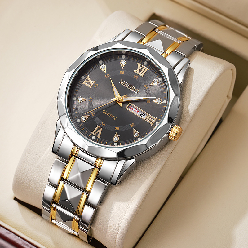 4:Two-tone gold and black dial with roman numerals