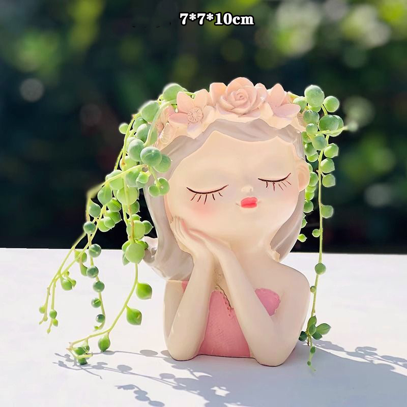 Girl sleeping with pink hands