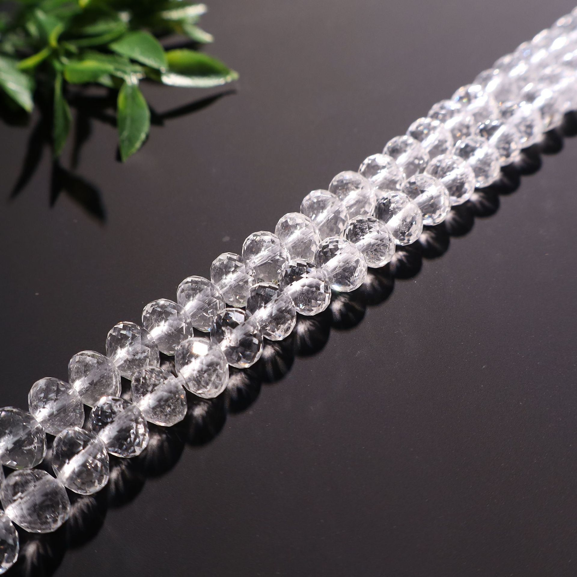 2:5x8mm faceted abacus beads (about 65 pieces)