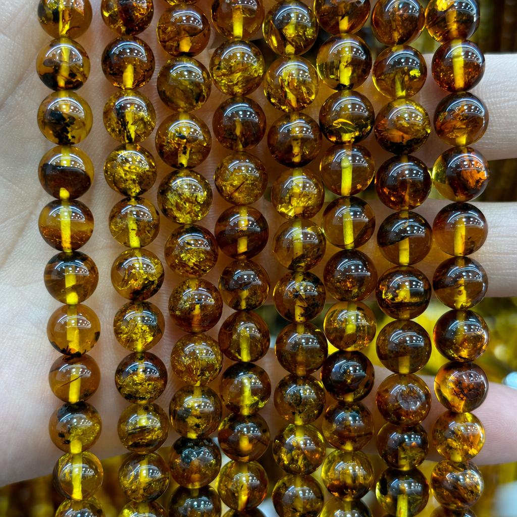 36:9mm amber round beads (about 45 pieces)