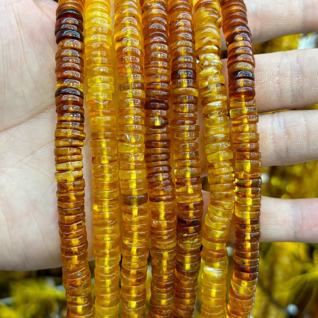 39:3x8mm amber spacers (about 142 pieces)