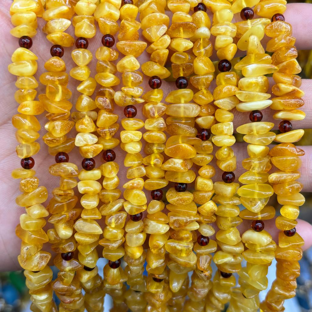 44:6-8mm amber medium hole gravel (line length 38cm )