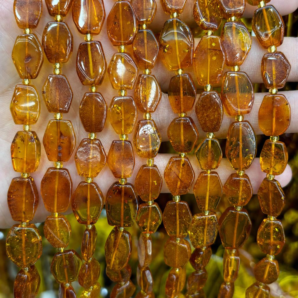 11x14mm amber rhombus pieces (about 23 pieces)
