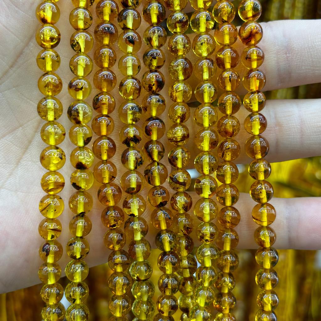6mm amber round beads (about 62 pieces)
