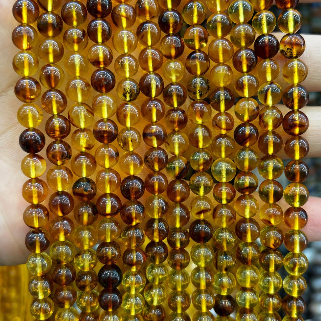 7mm amber round beads (about 55 pieces)