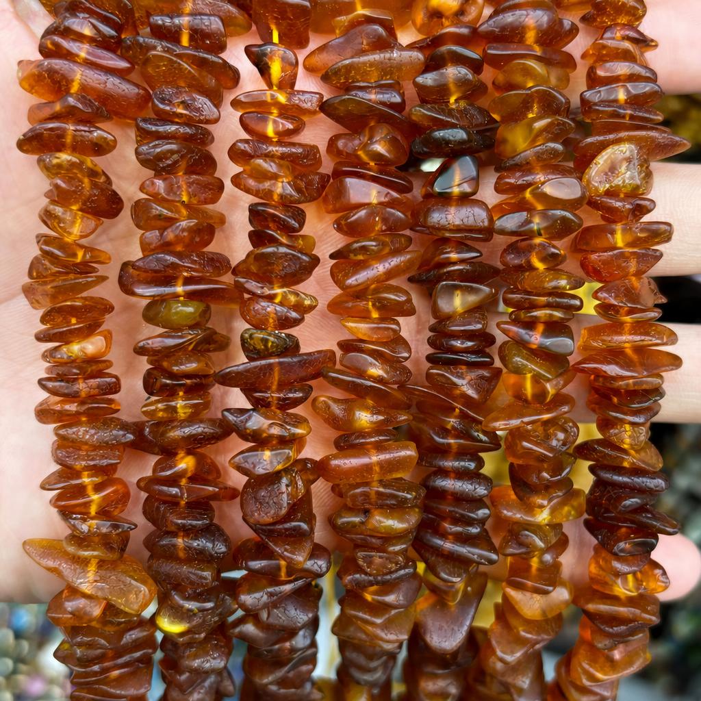 12-14mm amber medium hole gravel (line length 38cm