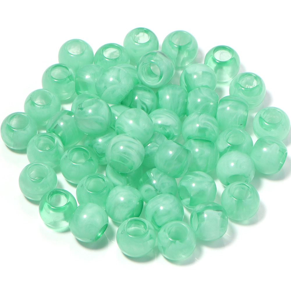 47:Translucent green beads