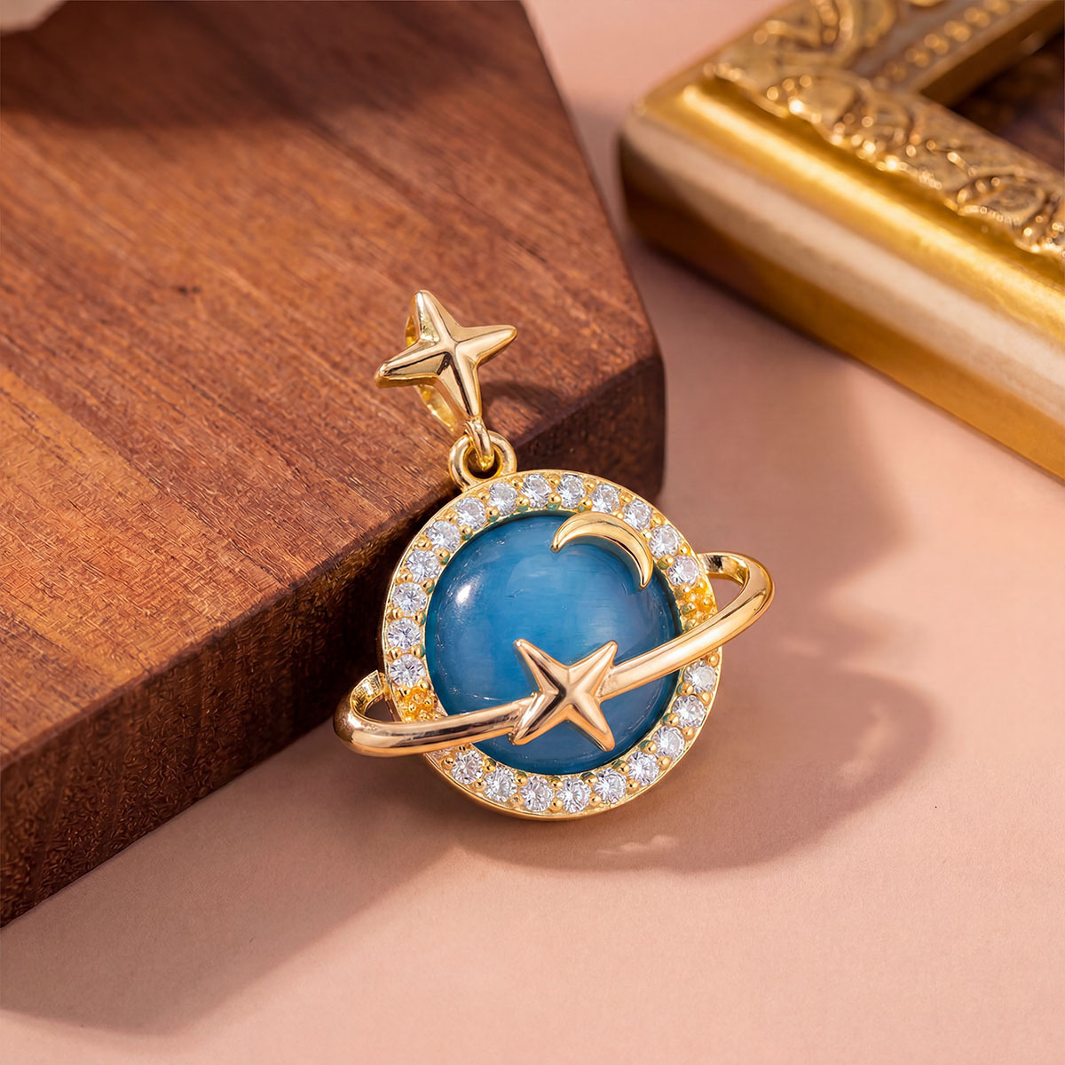 Xl12 blue cat eye planet pendant gold