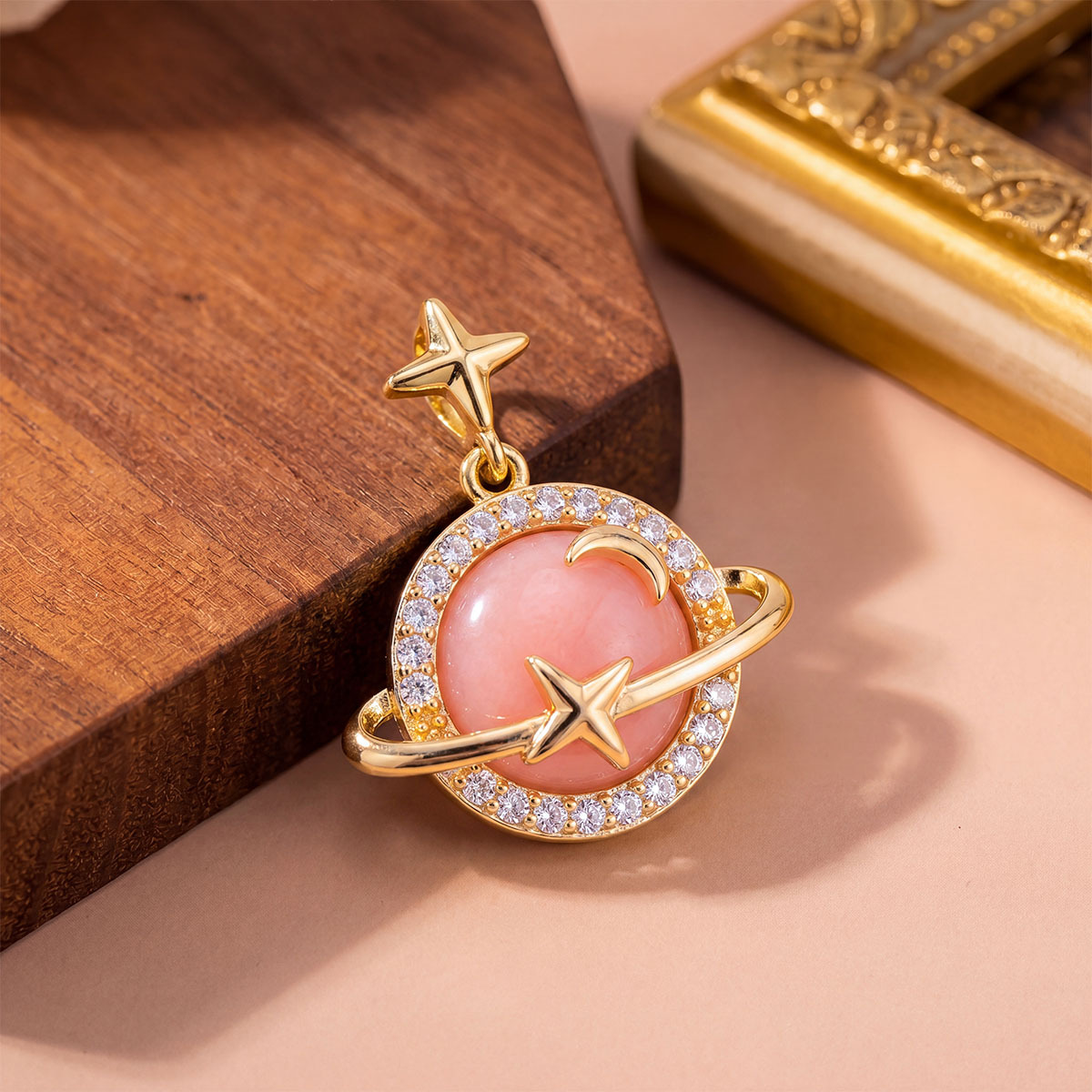 1:Xl12 pink cat eye planet pendant gold