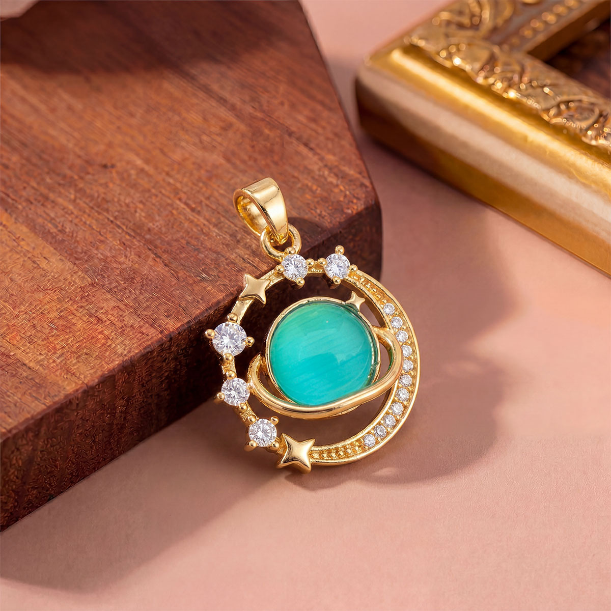12:Xl1844 planet blue cat eye pendant gold small
